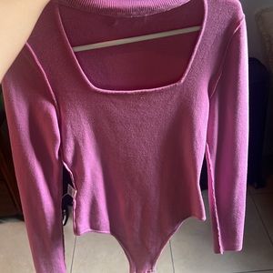 Pink turtle neck/ bodysuit top, worn once, size small